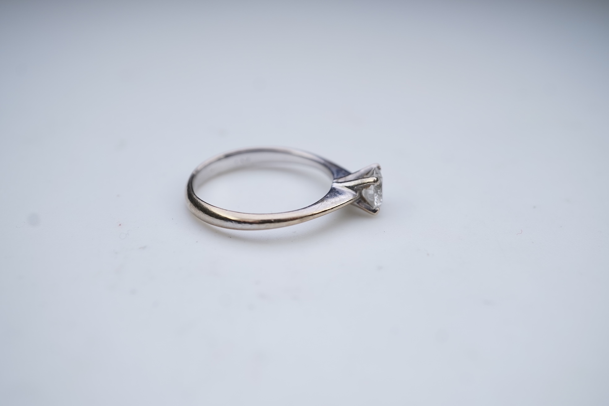 A diamond solitaire ring